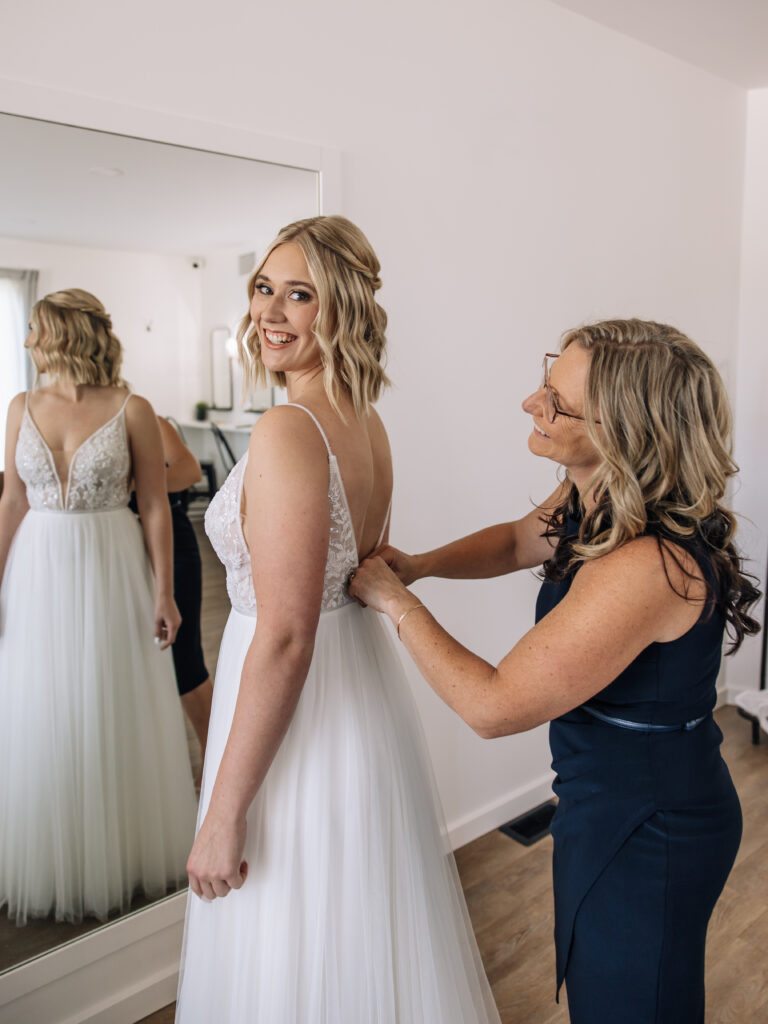 Mom and Daughter at the White Poplar Wedding Venue in Winnipeg with their dress