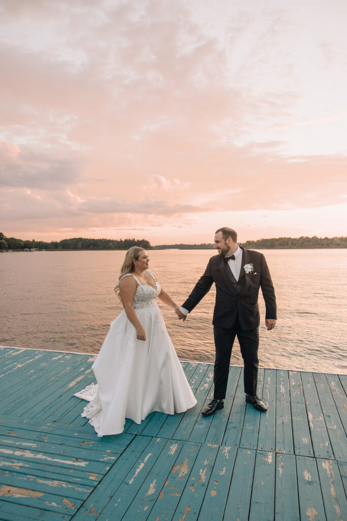 Manitoba wedding photographer capturing candid golden hour portraits with couple