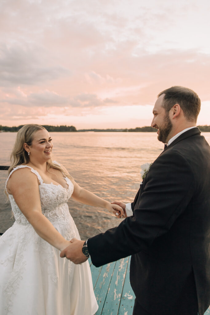Manitoba wedding photographer capturing candid golden hour portraits with couple